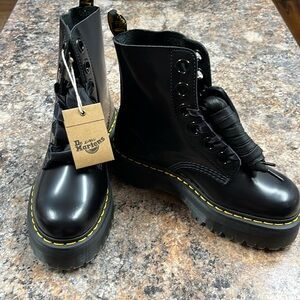 Brand new with tags Dr Martens black boots.  Size 8 women.